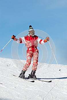 Happy ski girl in red