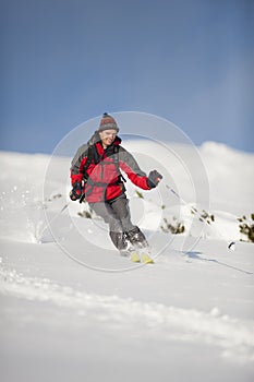 Happy skier in action