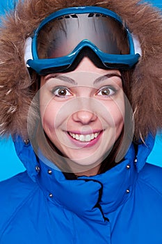 Happy skier with mask