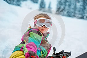 Happy skier in ski goggles