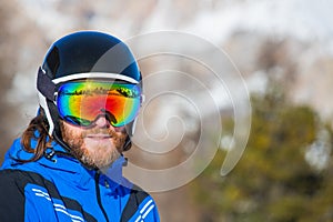 Happy skier on slope at Cortina