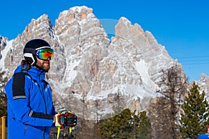 Happy skier on slope at Cortina photo