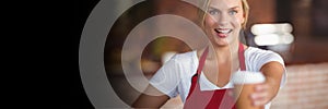 Happy small business owner woman holding a coffee