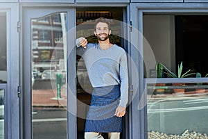 Happy, small business and portrait of man at coffee shop for service industry, welcome or smiling. Confidence