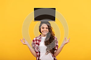 happy smart teen girl meditating with laptop on head presenting school online lesson, estudy