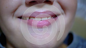 Happy smile on Boy`s face. Close-up of baby`s lips and mouth. Child Shows Teeth