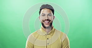Happy, smile and face of man on green screen for confident, casual and pride. Happiness, natural and portrait of male
