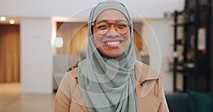 Happy, smile and muslim with a business woman laughing alone in her office at work. Portrait, funny and islamic with a