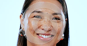 Happy, smile and portrait of Asian woman in a studio with positive, good and confident attitude. Excited, headshot and