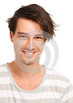 Happy, smile and portrait of man in studio for casual, trendy and cool fashion. Happiness, edgy and confidant with face photo