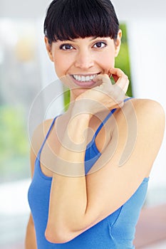 Happy, smile and portrait of woman in home with good, confident and positive attitude. Excited, happiness and young