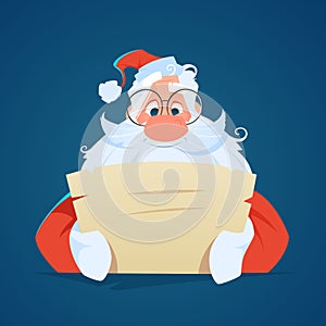 Happy smile santa claus reading a letter