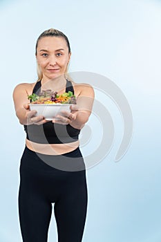 Happy smile senior woman portrait holding bowl of vegan. Clout