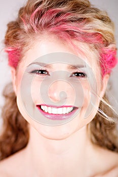 Happy smile of woman with coloful makeup
