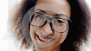 Happy smiling african american young woman face