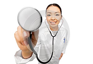 Happy smiling asian female doctor with stethoscope