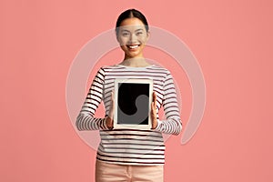 Happy Smiling Asian Lady Holding Digital Tablet With Black Blank Screen