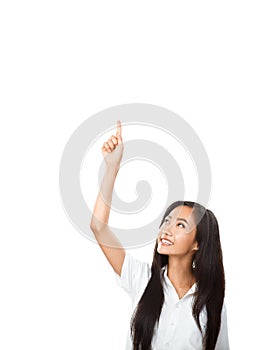 Happy smiling Asian woman pointing up and looking at camera