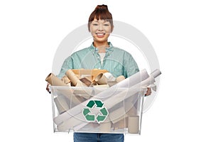 happy smiling asian woman sorting paper waste