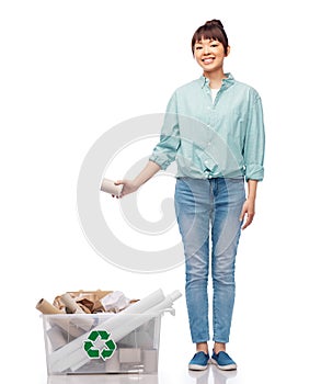 happy smiling asian woman sorting paper waste