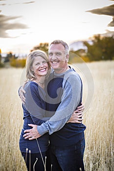 Happy and smiling attractive mature couple portrait outdoors