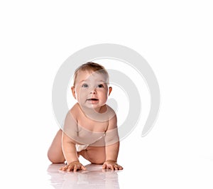 Happy smiling baby on floor over white background