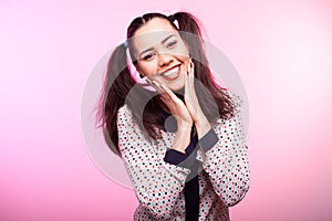 Happy smiling beautiful brunette woman looking at the camera