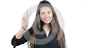 Happy smiling beautiful young woman showing two fingers or victory gesture, isol