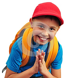 Happy smiling boy with backpack isolated over white