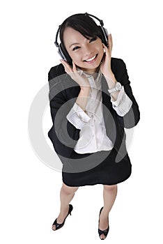 Happy smiling business woman listen music