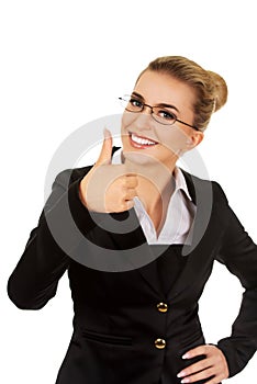 Happy smiling business woman with ok hand sign