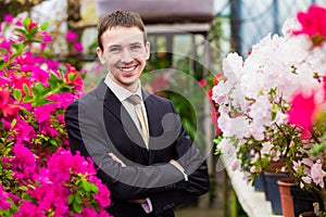 Happy smiling businessman in a business suit