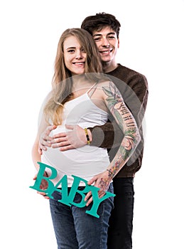 Happy smiling couple in love expecting child