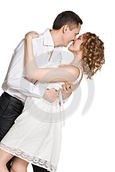 Happy smiling couple in love. Isolated over white