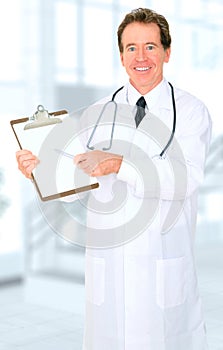 Happy Smiling Doctor Point At Blank Board