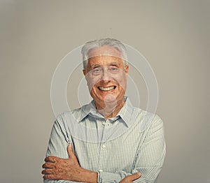 Happy smiling elderly man portrait.