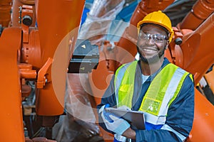happy smiling engineer worker African black people work in factory industry