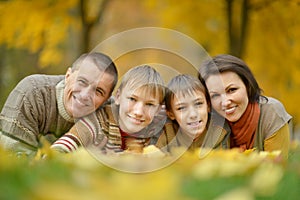 Family in autumn forest