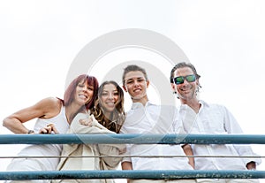 Happy smiling family on a pier