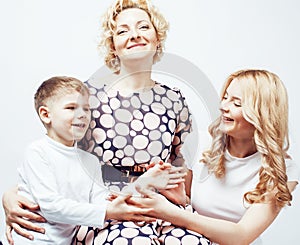 Happy smiling family together posing cheerful on white background, lifestyle people concept, mother with son and teenage