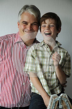 Happy  smiling father and his son