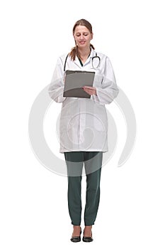 Happy smiling female doctor with stethoscope writing on clipboard