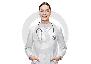 Happy smiling female doctor in white coat