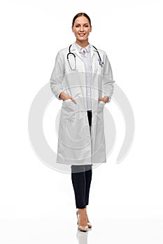 Happy smiling female doctor in white coat