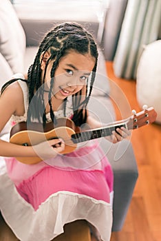 Happy smiling girl,dreadlocks hair style