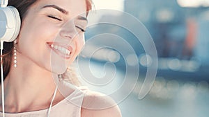 Happy smiling girl listen to music