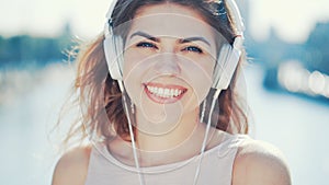 Happy smiling girl listen to music