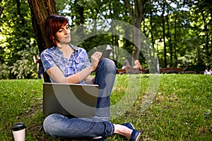 Happy smiling girl working online.