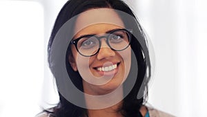 Happy smiling indian young woman in glasses