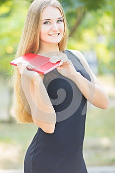 Happy smiling lady reading book